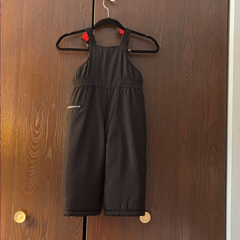 Carter’s child’s snow bibs. Black. Size 4T